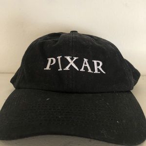Black hat with Pixar stitched on front. Adjustable
